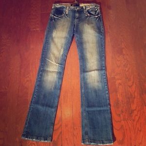 Distressed/Destructed bootcut jeans.